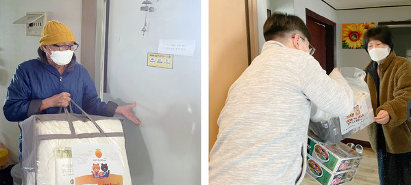 일산종합사회복지관 관계자가 설 선물을 전달하고 있다.